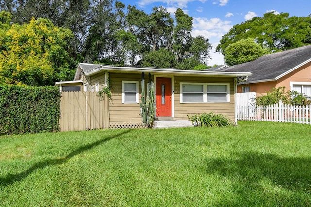 ranch-style house with a front yard