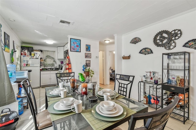 dining room with light tile patterned floors