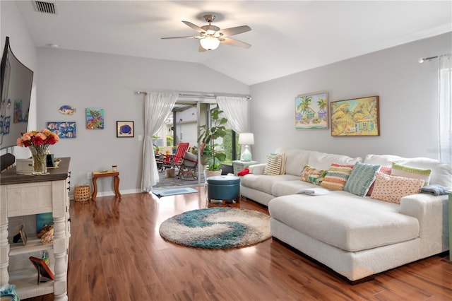 living room with hardwood / wood-style floors, plenty of natural light, ceiling fan, and lofted ceiling