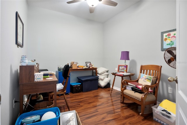 home office with ceiling fan and dark hardwood / wood-style floors