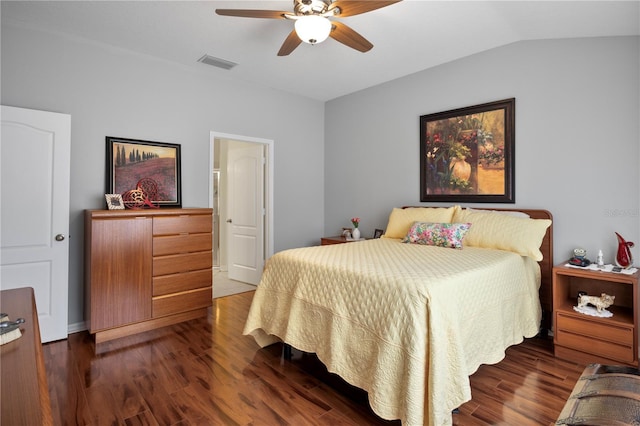 bedroom featuring ceiling fan, dark hardwood / wood-style floors, and vaulted ceiling