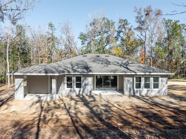 view of front of house with a patio area