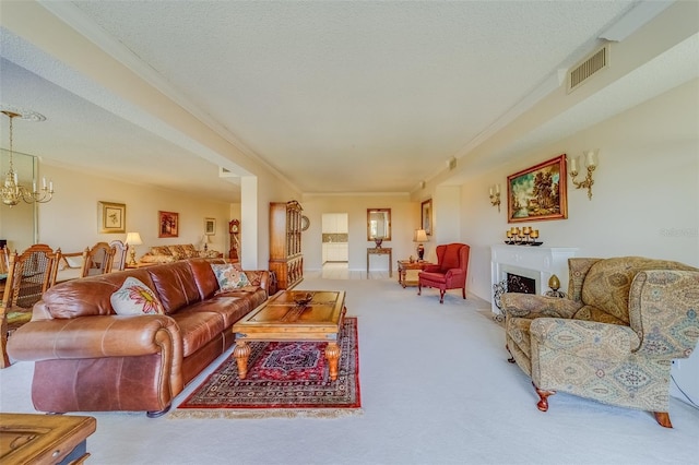 carpeted living room featuring an inviting chandelier, crown molding, and a textured ceiling