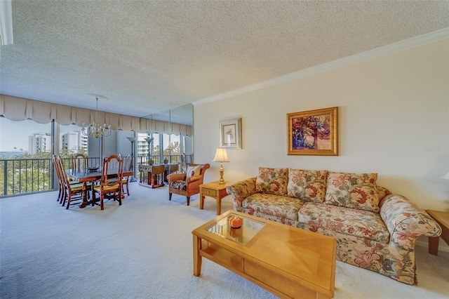 living room featuring ornamental molding, light carpet, and a textured ceiling