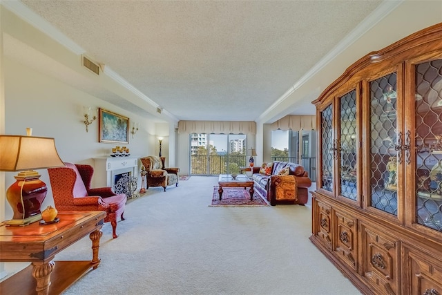 living area with ornamental molding, light colored carpet, and a textured ceiling