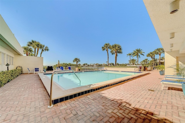 view of pool featuring a patio area