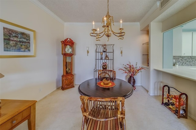 carpeted dining area with crown molding, a chandelier, and a textured ceiling