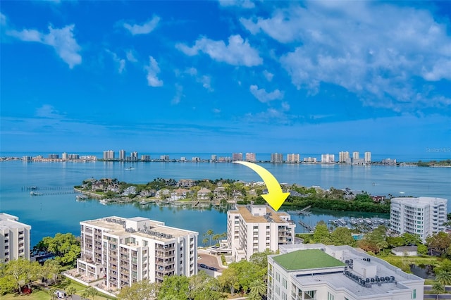 birds eye view of property featuring a water view