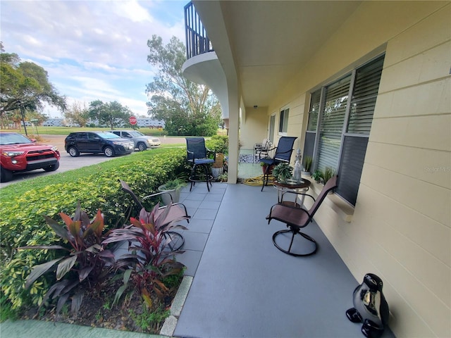 view of patio / terrace featuring a balcony