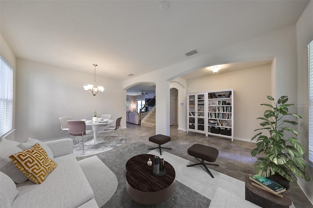 living room featuring a chandelier