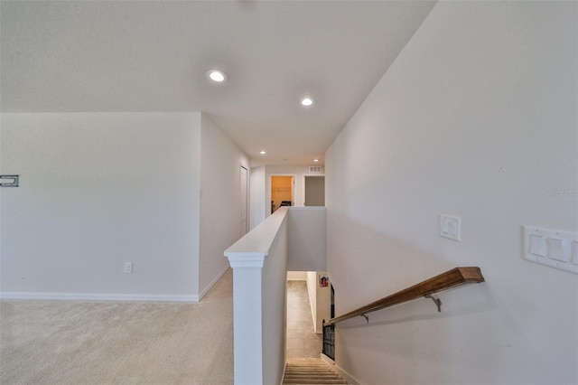 staircase with carpet