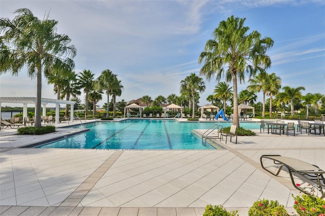 view of swimming pool featuring a patio area