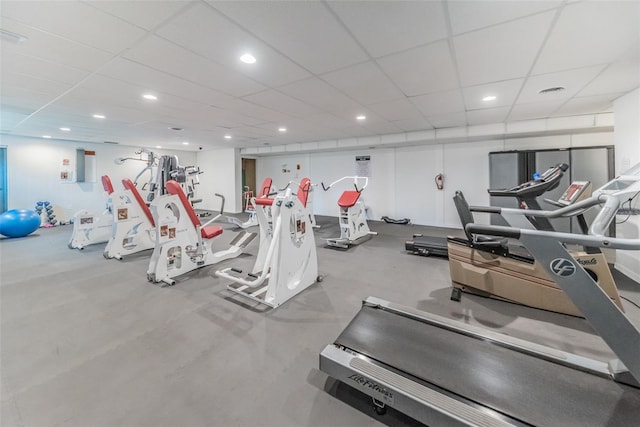 workout area with a drop ceiling