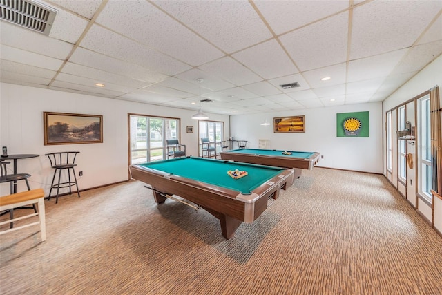 recreation room with billiards, a paneled ceiling, and carpet