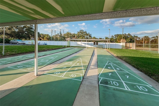 view of home's community with a yard