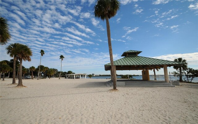 surrounding community featuring a water view and a gazebo