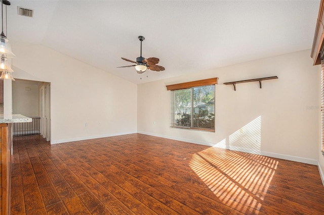 unfurnished living room with lofted ceiling, ceiling fan, and dark hardwood / wood-style floors