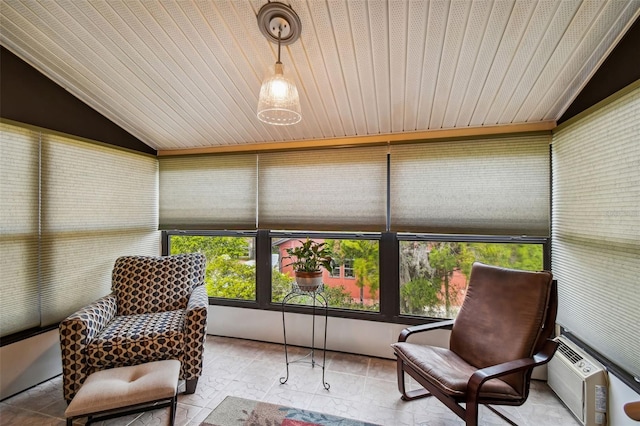 sunroom featuring wood ceiling and lofted ceiling