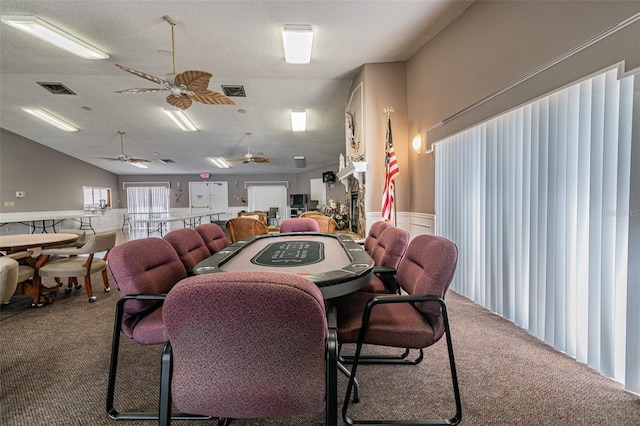 4028 Davit Dr Unit 4028, New Port Richey, FL 34652 - dining room featuring carpet floors, a wainscoted wall, and a ceiling fan