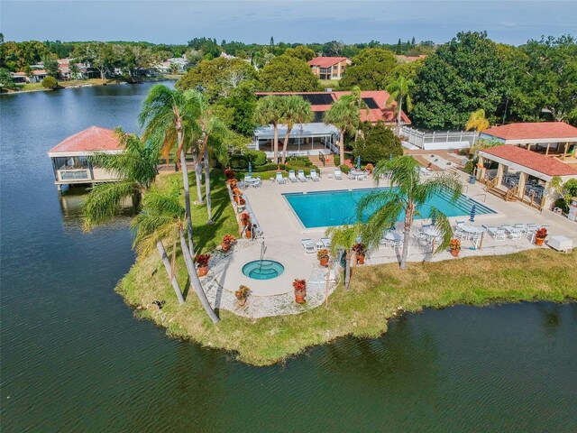 4028 Davit Dr Unit 4028, New Port Richey, FL 34652 - bird's eye view of a pool area and a nearby body of water