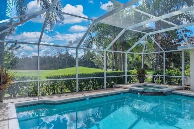 view of swimming pool featuring a lanai and an in ground hot tub