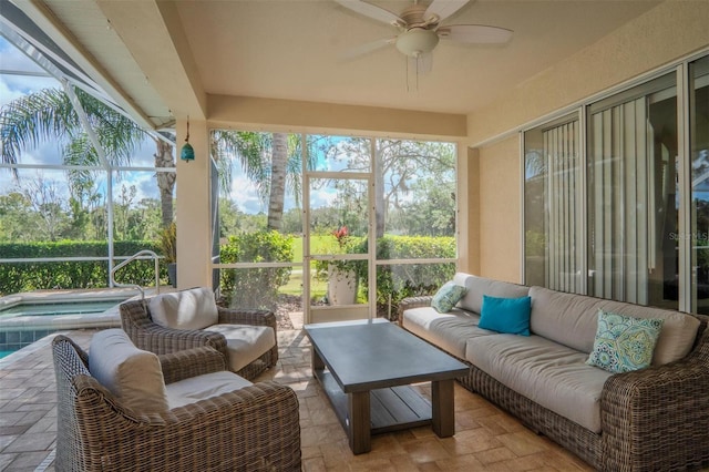 sunroom with plenty of natural light and ceiling fan