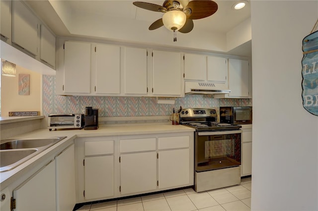 kitchen with white cabinetry, electric stove, and custom exhaust hood