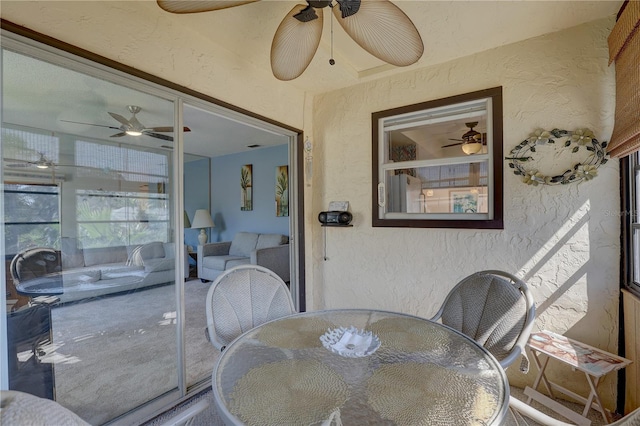 dining area with ceiling fan