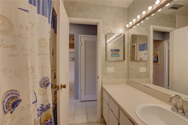 bathroom featuring vanity and tile patterned flooring