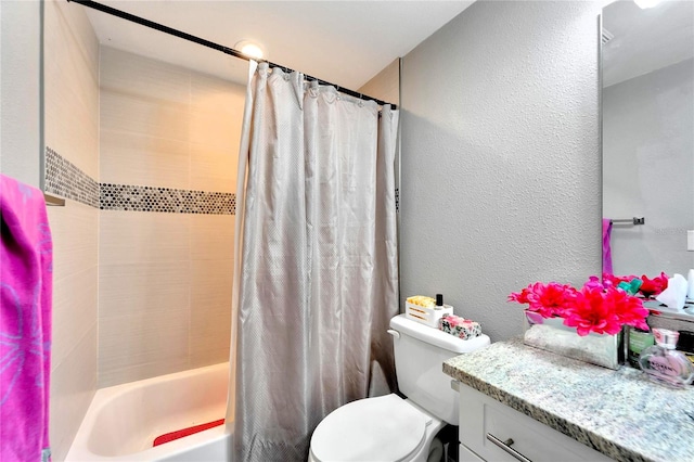 full bathroom featuring toilet, vanity, and shower / bathtub combination with curtain