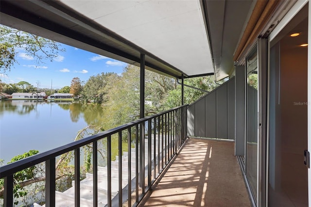 balcony featuring a water view