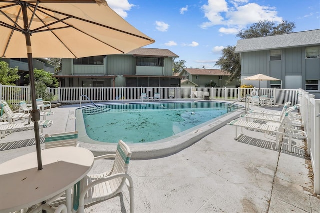 view of pool featuring a patio