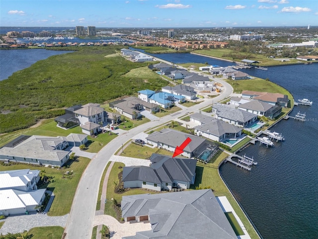 bird's eye view with a water view