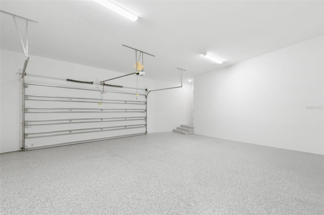 1810 4th St E, Palmetto, FL 34221 - garage featuring a garage door opener