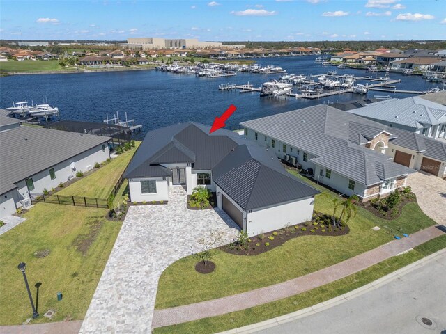 1810 4th St E, Palmetto, FL 34221 - aerial perspective of suburban area featuring a large body of water