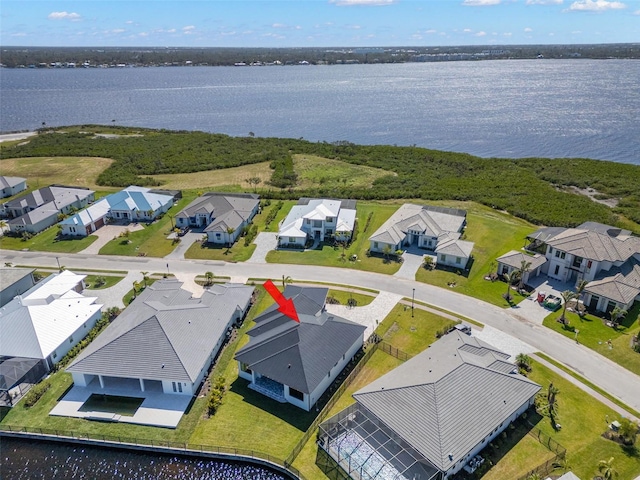 1810 4th St E, Palmetto, FL 34221 - aerial view of residential area featuring a nearby body of water
