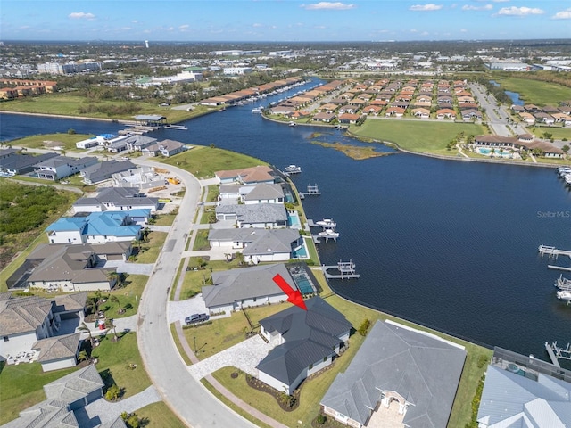 1810 4th St E, Palmetto, FL 34221 - aerial view of property and surrounding area featuring nearby suburban area and a nearby body of water
