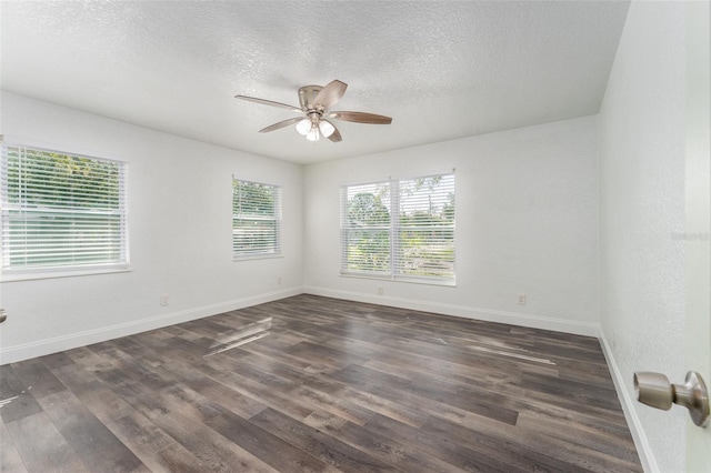 unfurnished room featuring dark hardwood / wood-style floors, a textured ceiling, and ceiling fan