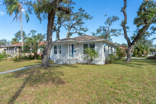 ranch-style house with a front yard