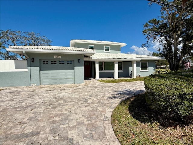 view of front of house with a garage