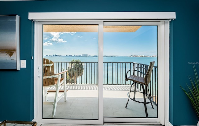 entryway with a water view