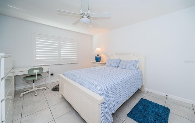 tiled bedroom with ceiling fan