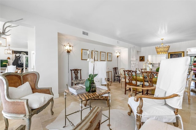 living room featuring a chandelier