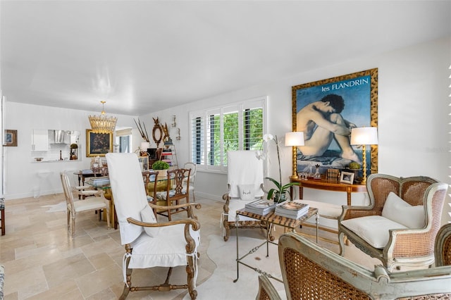 living room featuring a chandelier