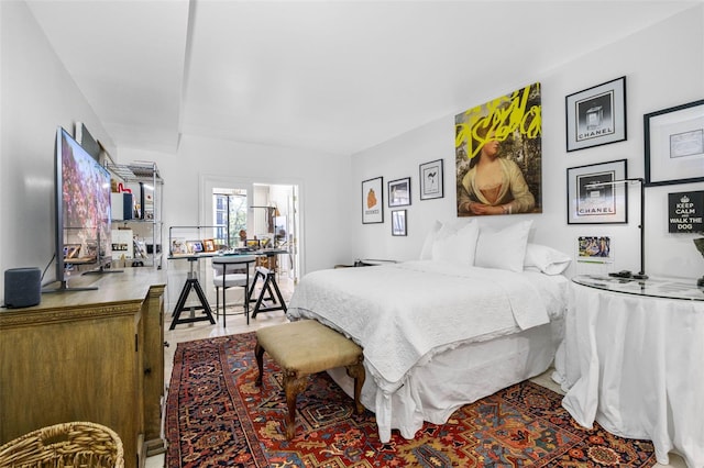 bedroom featuring hardwood / wood-style flooring