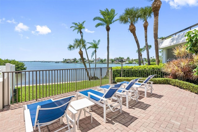 view of patio / terrace with a water view