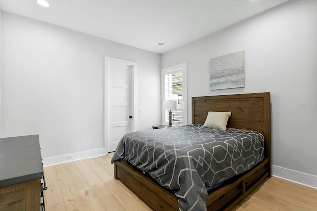 bedroom featuring hardwood / wood-style flooring