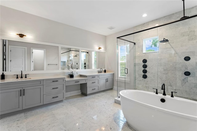 bathroom featuring vanity and plus walk in shower