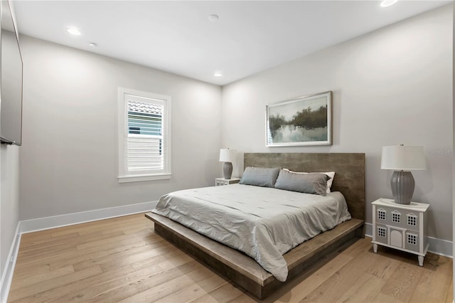 bedroom featuring light wood-type flooring