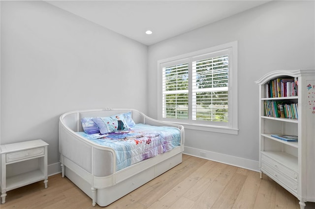 bedroom featuring light hardwood / wood-style flooring